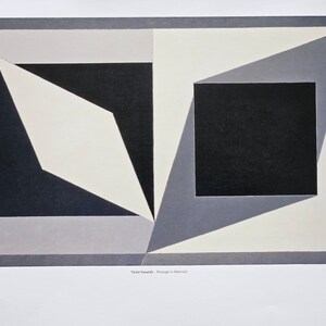 May include: Abstract geometric art print featuring a black square, white diamond, and gray shapes on a white background. The print is titled "Hommage to Malevich" by Victor Vasarely.