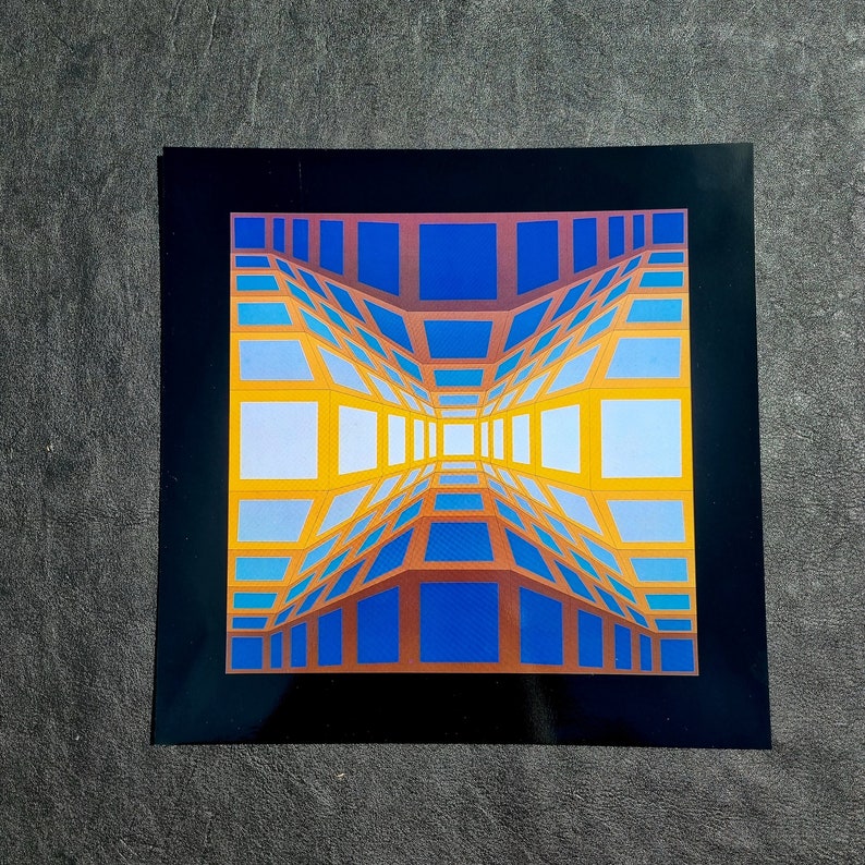 May include: A colorful abstract print of a geometric pattern with a perspective view of a hallway. The print features a repeating pattern of squares in shades of blue, yellow, and orange.