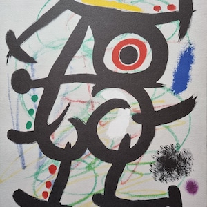 Joan Miró "Mujer y pájaro. 1969" Litografía vintage de los años 80 Edición limitada, firmada impresa. Dimensiones 51,8 x 36,5 cm