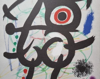 Joan Miro "Woman and Bird. 1969" Vintage lithograph from the 1980s. Limited edition, signed on the print. Dimensions: 51.8 x 36.5 cm.