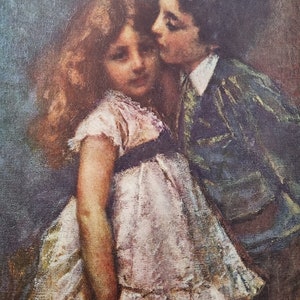 May include: An oil painting depicting two figures in a close embrace. One figure has long wavy auburn hair and wears a white dress with a dark sash. The other figure has dark hair and wears a dark blue jacket with a white collar. The brushwork is visible.
