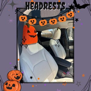 May include: A car interior featuring orange crochet pumpkin headrests with jack-o'-lantern faces. A banner of smiling pumpkin faces hangs above the headrests. The words "PUMPKIN HEADRESTS" are at the top of the image.