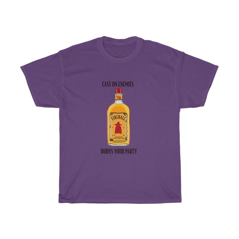 May include: Purple t-shirt featuring a graphic of a Fireball whiskey bottle with the text "Cast on enemies, burns your party."