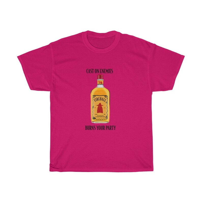 May include: Pink t-shirt featuring a graphic of a Fireball whiskey bottle with the text "Cast on enemies, burns your party."