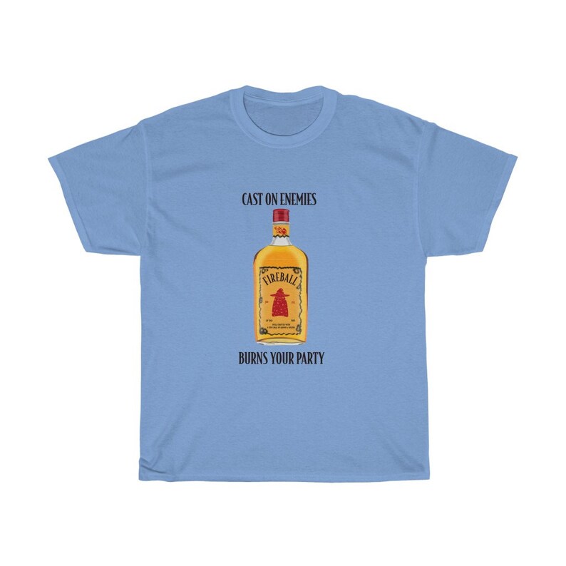 May include: Light blue t-shirt with a black graphic of a bottle of Fireball whiskey. The text "Cast on enemies" and "Burns your party" is printed on the shirt.