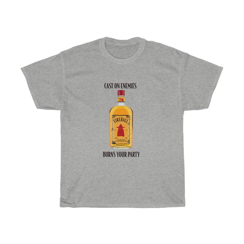 May include: A grey t-shirt with the text "Cast on enemies" and "Burns your party" printed on it. A bottle of Fireball whiskey is pictured in the centre of the shirt.