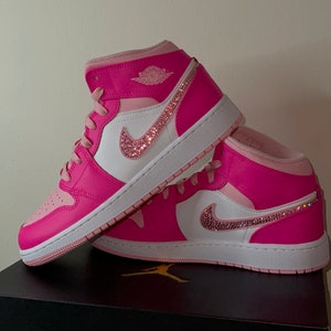 Air Jordan 1 Mid GS 'Fierce Pink'. Barbie pink sneakers with crystal swooshes