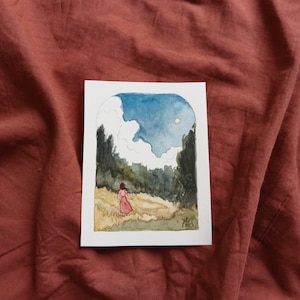 May include: A watercolor painting of a woman in a pink dress walking through a field with a blue sky and a white cloud above. The sun is shining in the sky.