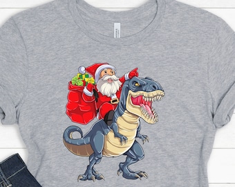 Cute boys Christmas Shirt, Santa riding Dinosaur shirt, Christmas gift for boys,  Cute Funny xmas tee  Christmas New Year Shirt cute spirit