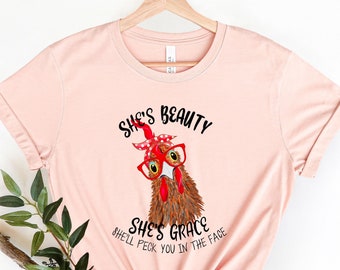 She&#39;s Beauty ~ She&#39;s Grace ~ She&#39;ll Peck You In The Face Chicken Short Sleeve Tee ~ Chicken Lady ~ Fun T-Shirt