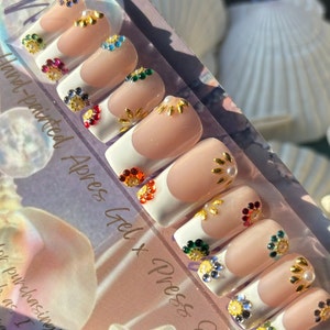 Razzle Dazzle | White French tips w/ multicolor gem/ gold rivets pearl / bead embellished flowers | Summer | Med Square| Apres gel X