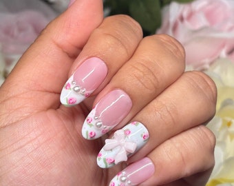 Rosette | White French tips w/ pink roses + pearl/pink bow accent | Spring Summer | Medium Almond | Apres Gel X