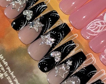 Showstopper | Black French tips w/ white+ silver flash reflect gel lines star/heart charms + gems | Apres gel x | Long coffin