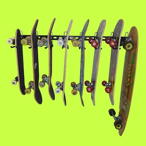 Skateboard rack. Wall storage and display rack for up to 8 skateboards. GearHooks