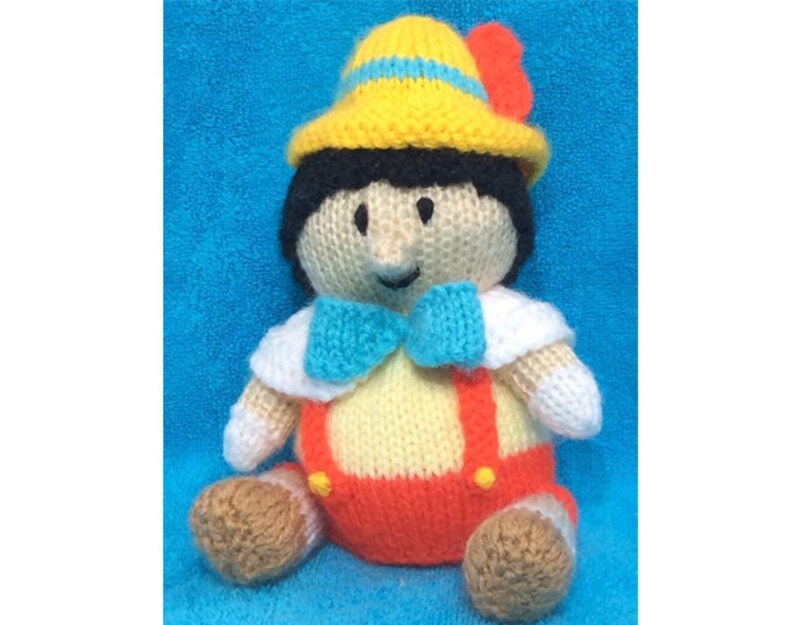 Pattern For Pinocchio Overalls KNITTING PATTERN - Pinocchio Inspired Chocolate Orange Cover / 17 Cms ...