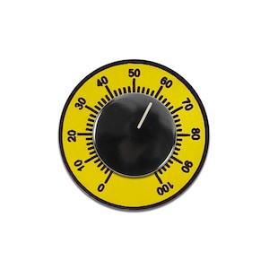 May include: A yellow circular dial with black numbers from 10 to 100, a black pointer, and a black centre circle. The dial is a decorative element.