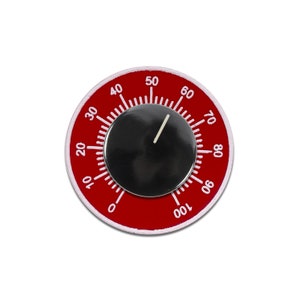 May include: Red circular timer with white numbers from 0 to 100. The timer has a black dial with a white pointer.