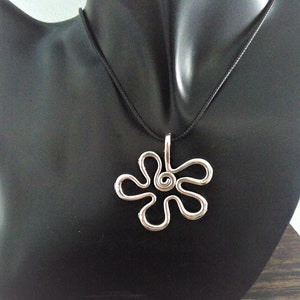 Retro style silver flower pendant