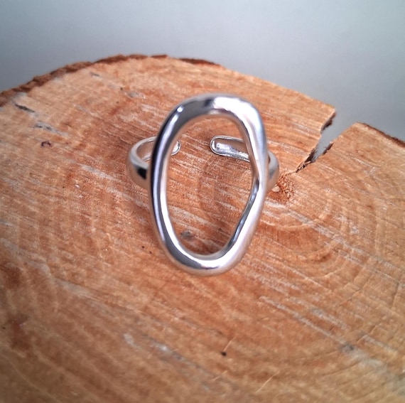 Chunky, oval shaped, adjustable silver ring