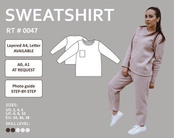 May include: A white sweatshirt pattern with a pocket on the front. The pattern is layered on a gray background with text that reads "SWEATSHIRT RT # 0047 Layered A4, Letter AVAILABLE A0, A1 AT REQUEST Photo guide STEP-BY-STEP SIZES: US: 2, 4, 6 UK: 6, 8, 10 EU: 34, 36, 38 SKILL LEVEL:". A woman is wearing a pink sweatshirt and matching pants.