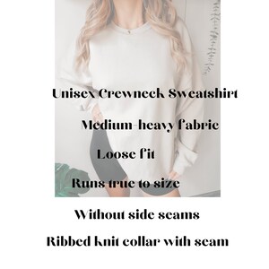 May include: A unisex crewneck sweatshirt made from a medium-heavy fabric. The sweatshirt has a loose fit and runs true to size. It features a ribbed knit collar with a seam and no side seams.