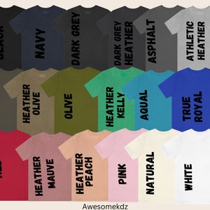 May include: A selection of t-shirts in various colours and styles, including black, navy, dark grey, army, olive, red, heather mauve, heather peach, pink, natural, white, true royal, and athletic heather.