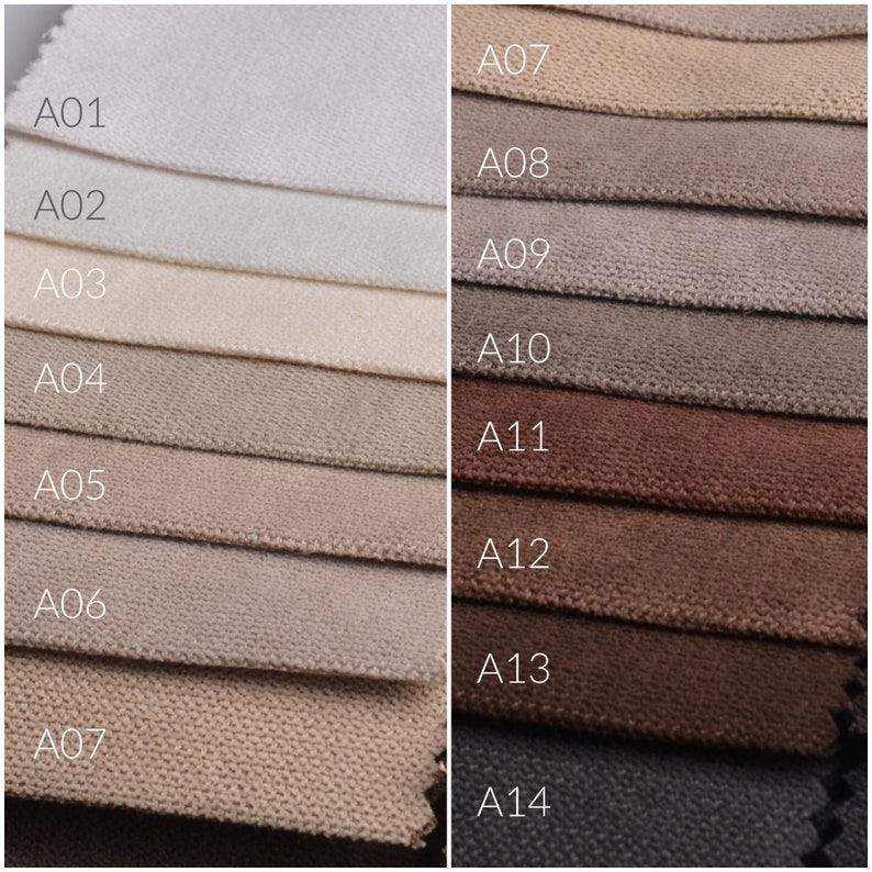Peut inclure: Un nuancier de tissu pr&eacute;sentant quatorze couleurs diff&eacute;rentes. Les &eacute;chantillons sont dispos&eacute;s en rang&eacute;es, chacun &eacute;tant &eacute;tiquet&eacute; avec un code de A01 &agrave; A14. Les couleurs vont du beige clair au marron fonc&eacute; et au gris.