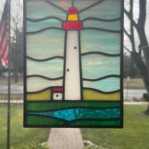 Acchiappasole gigante a forma di faro di Cape May