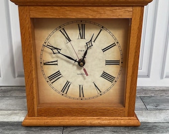 Horloge à quartz Kienzle vintage : boîtier en bois, chiffres romains, fabrication allemande