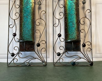 Par de apliques de pared con forma de pilar de vela de cristal craquelado azul y metal marrón Pier 1.