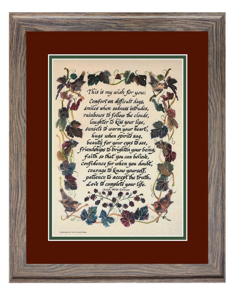 Puede incluir: Obra de arte enmarcada con un marco de madera marr&oacute;n y gris. La obra presenta un poema escrito a mano con p&aacute;jaros y follaje decorativos. El texto dice "This is my wish for you..." y contin&uacute;a con versos inspiradores. La obra de arte est&aacute; sobre un fondo blanco y rojo oscuro.