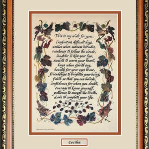 Puede incluir: Obra de arte enmarcada con un poema, en un marco de madera marr&oacute;n con detalles dorados. El poema, rodeado de vides y p&aacute;jaros, comienza con "This is my wish for you..." y est&aacute; firmado "Cecilia."