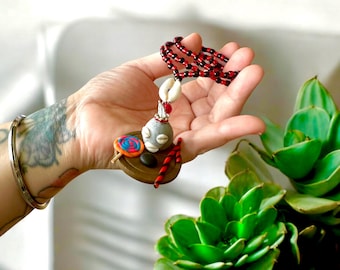 Eleggua rear view mirror amulet