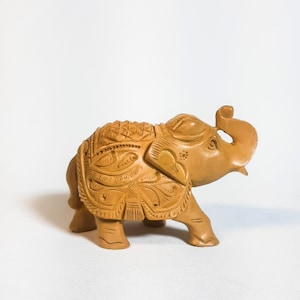 Hand-Carved Wooden Elephant Figurine: Indian Home Decor Sculpture