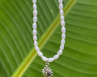 Freshwater Pearl necklace with Sterling Silver Sun charm