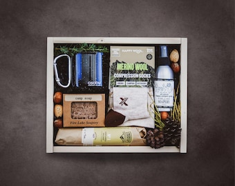 Personalized Camping Gift Box: Camp Mug, Wool Hiking Socks, Bug Spray, Camp Soap, Snacks & Custom Engraved Hardwood Box. Wool Blanket Option