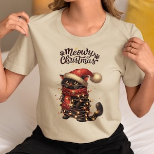 Christmas Lights and Santa Hat Cat Design Paw T-Shirt | Unisex Meowy Christmas Xmas Holiday Wear Funny Animal Festive Tee | Meowy Christmas