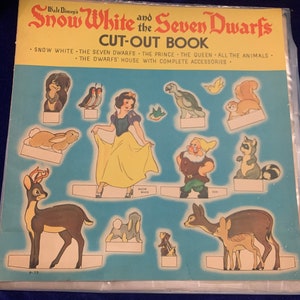 Raro libro recortado de muñecas de papel de Blancanieves y los siete enanitos de Walt Disney