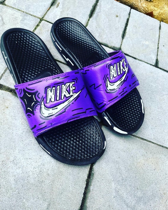 nike purple and gold slides