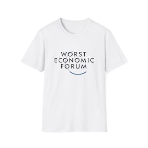 May include: A white, short-sleeved t-shirt with the text "WORST ECONOMIC FORUM" in black, stylized font. The design includes a curved blue line beneath the text. The shirt is a simple crew neck style.