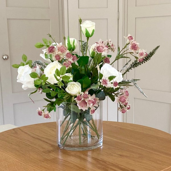 Artificial white roses with Astrantia and Veronica arrangement in a glass vase. Realistic high quality Spring flowers birthday gift for home