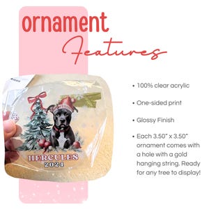May include: A clear acrylic circular ornament featuring a graphic of a dog wearing a Santa hat next to a Christmas tree. The text HERCULES 2024 is printed at the bottom. The ornament measures 3.50 inches by 3.50 inches and includes a gold hanging string.