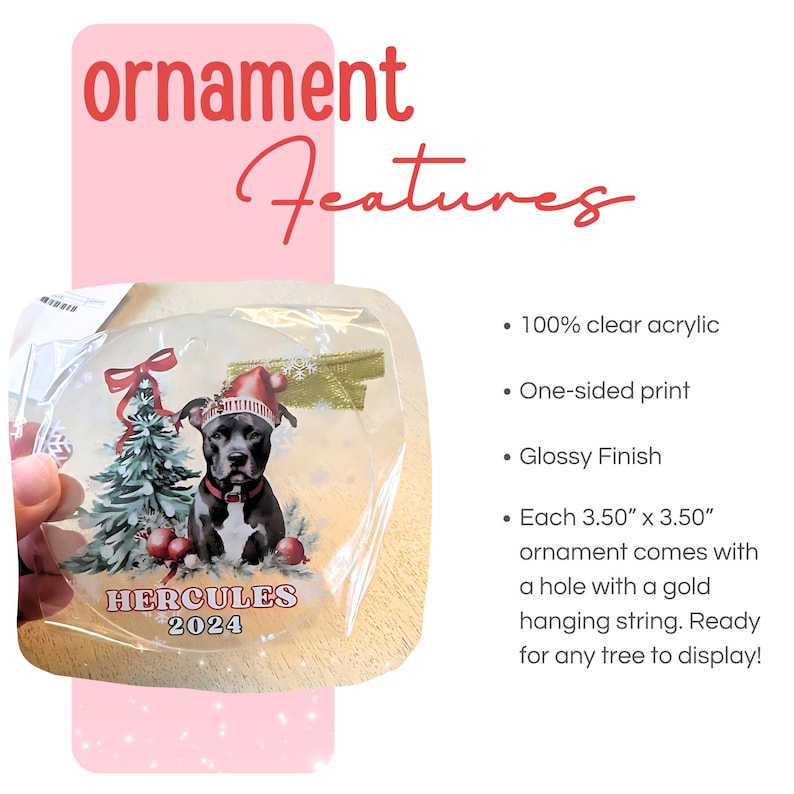 May include: A clear acrylic circular ornament featuring a graphic of a dog wearing a Santa hat next to a Christmas tree. The text HERCULES 2024 is printed at the bottom. The ornament measures 3.50 inches by 3.50 inches and includes a gold hanging string.