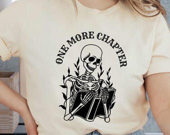 One More Chapter Shirt: Bookish Skeleton Reader Tee