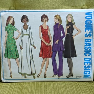 May include: A vintage sewing pattern for Vogue's Basic Design, featuring five different dress designs. The pattern is for size 2600.