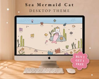 May include: A computer monitor displaying a Sea Mermaid Cat desktop theme with a cartoon illustration of a cat with a pink mermaid tail and a gold crown sitting on a rock underwater, surrounded by fish, coral, and seaweed on a sandy floor.