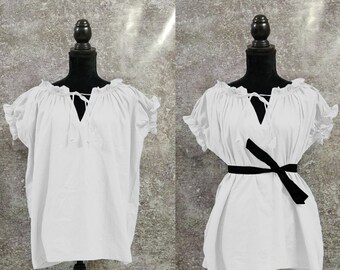 May include: Two white peasant tops with short sleeves and a gathered neckline. The top on the right has a black ribbon tied around the waist.