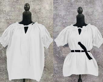 May include: Two white peasant tops with short sleeves and a gathered neckline. The top on the right has a black ribbon tied around the waist.