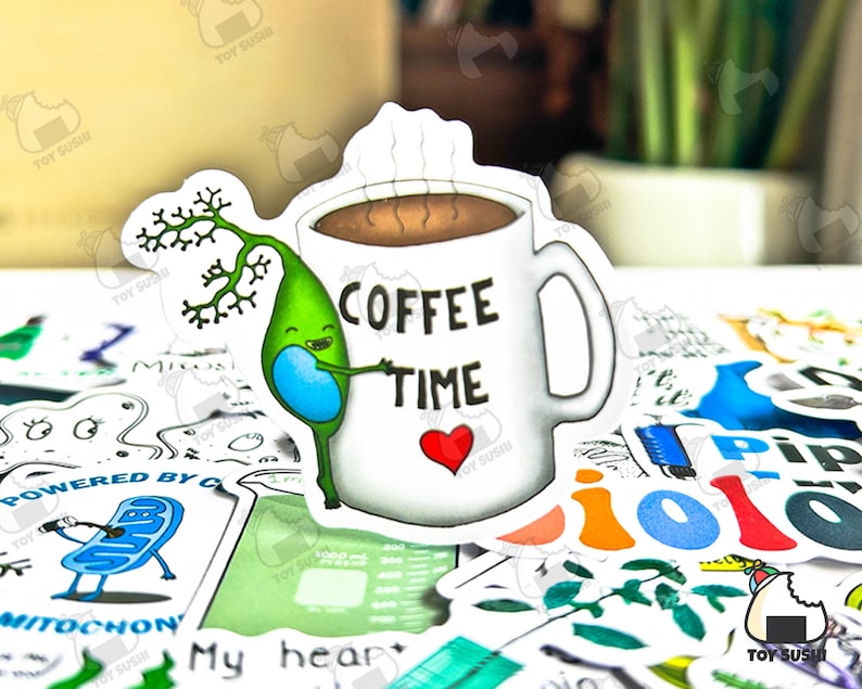 Puede incluir: Una pegatina blanca con una taza de caf&eacute; con las palabras "COFFEE TIME" y un coraz&oacute;n rojo. Un personaje de neurona verde, de dibujos animados, abraza la taza. La pegatina est&aacute; rodeada de otras pegatinas con tem&aacute;tica cient&iacute;fica.