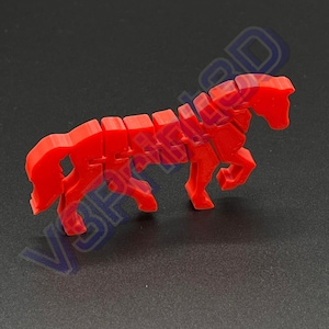 May include: A red 3D printed horse figurine. The horse is standing on all four legs and has a long tail.